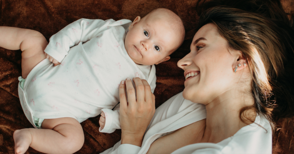 Pregnancy and Postpartum, Portrait of Mother and Newborn Baby, Mother Roasting